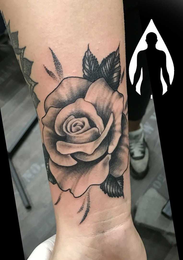 a rose cover-up tattoo on the wrist, darmstadt-dieburg, germany