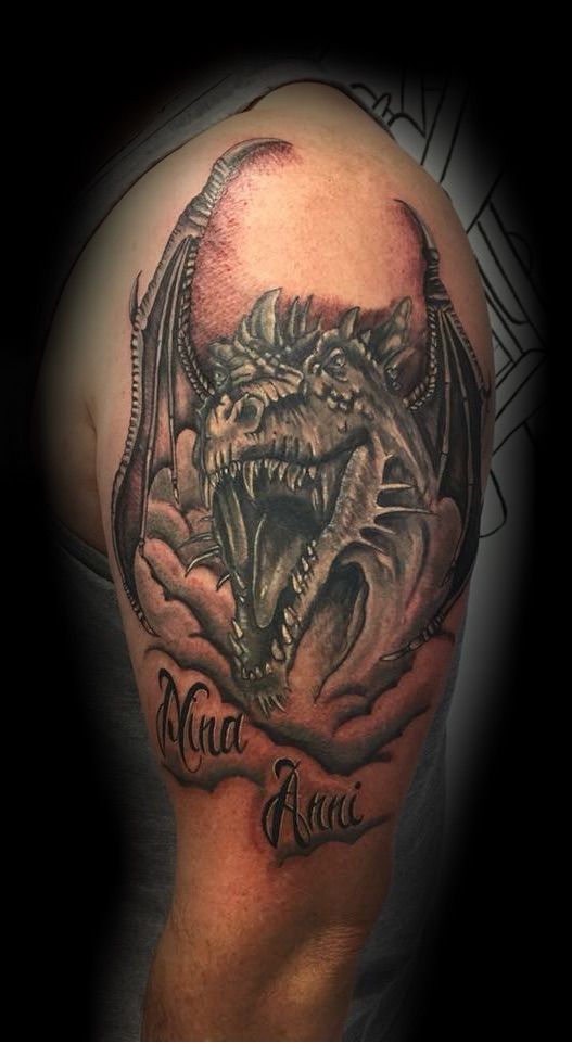 a cover-up tattoo with a dragon on it, main-tauber-kreis, germany