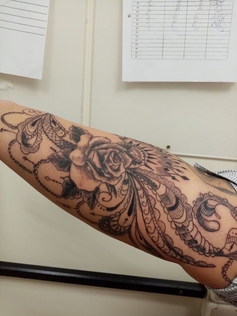 a woman's arm with a narben tattoo design on it, bielefeld, germany