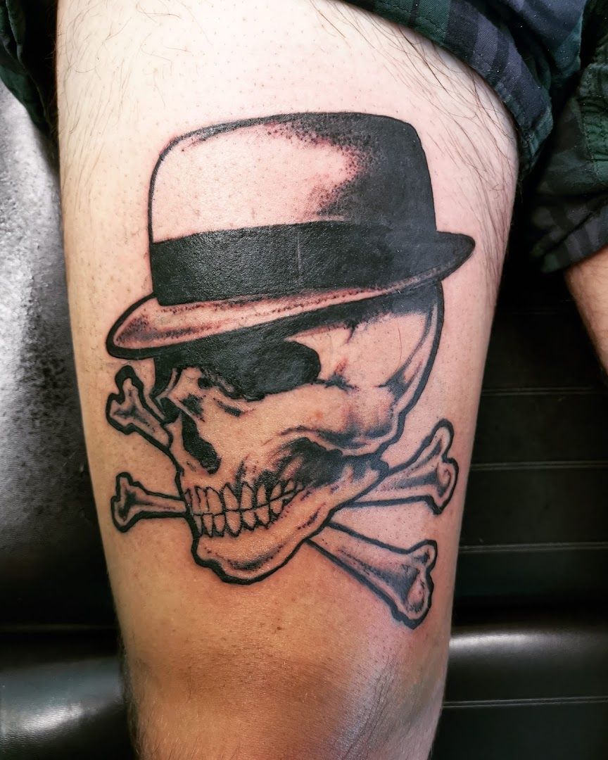 a skull with a hat and a skull on it