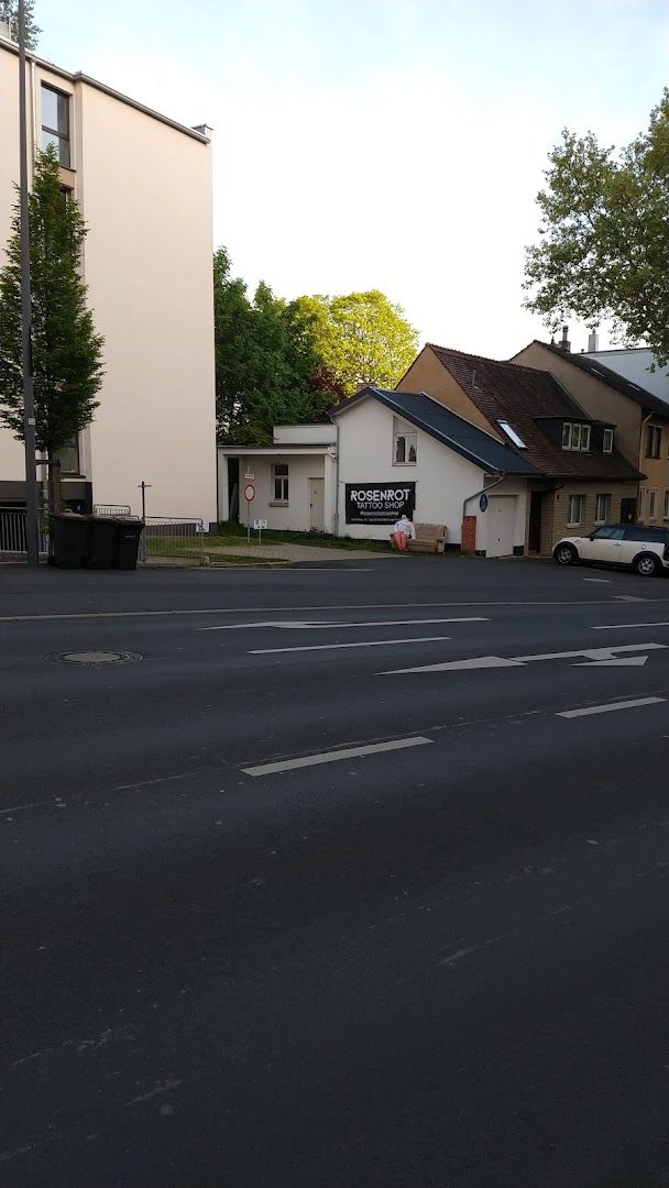 a street with a white car parked in front of it