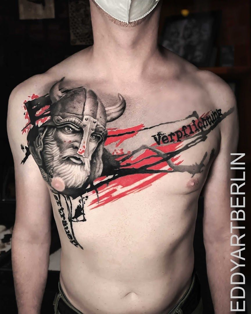 a man with a cover-up tattoo on his chest, berlin, germany