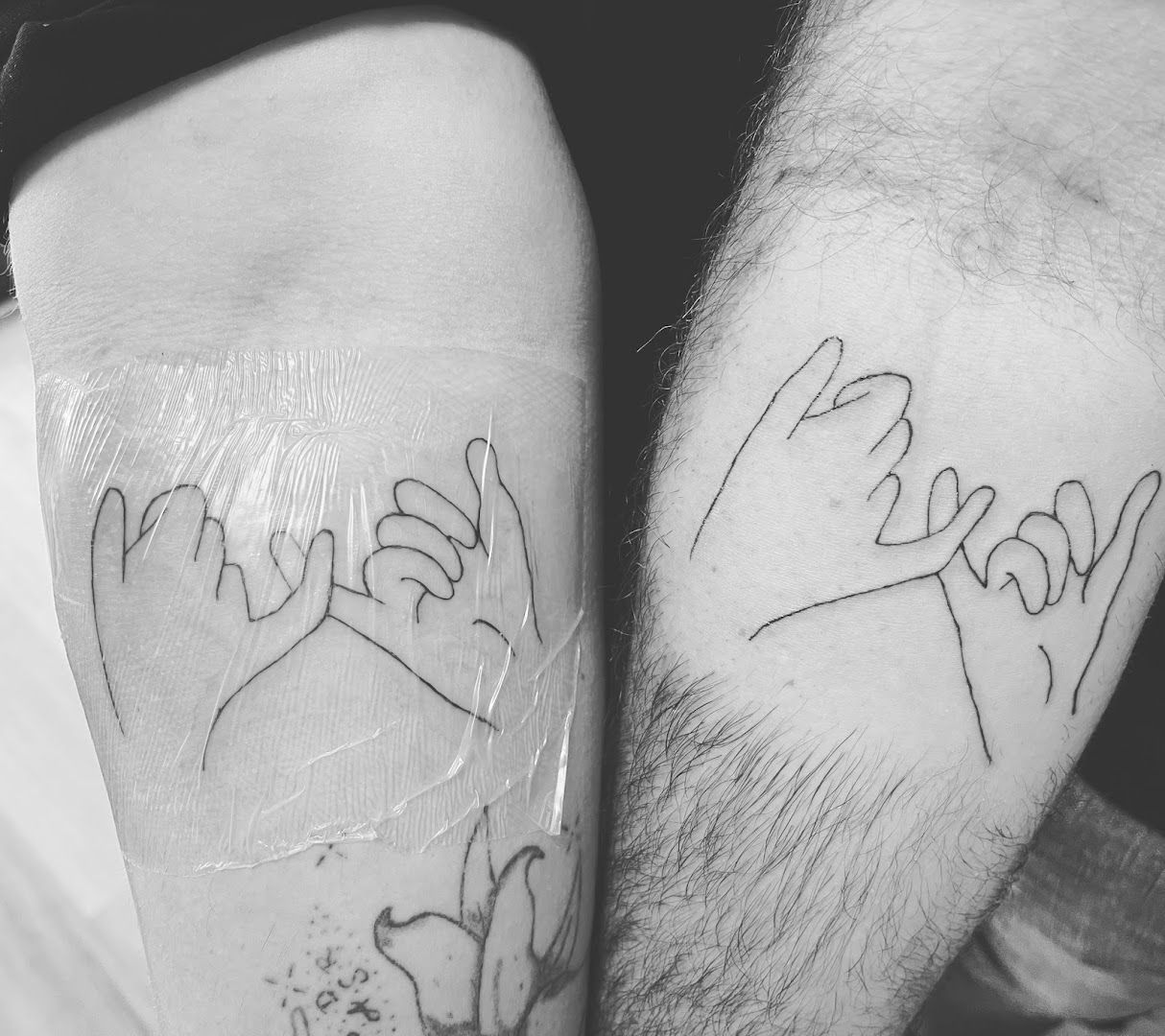 two people with narben tattoos on their legs, euskirchen, germany