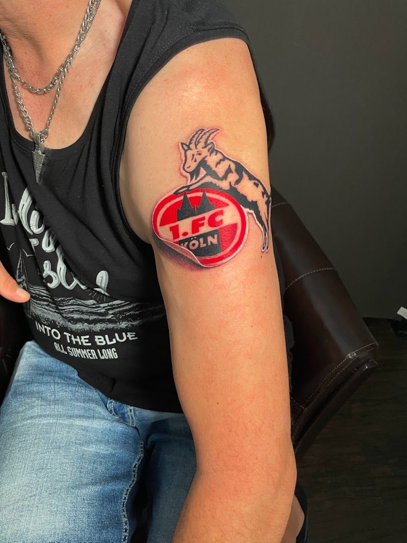 a woman with a japanische tattoos in leipzig on her arm, rhein-erft district, germany