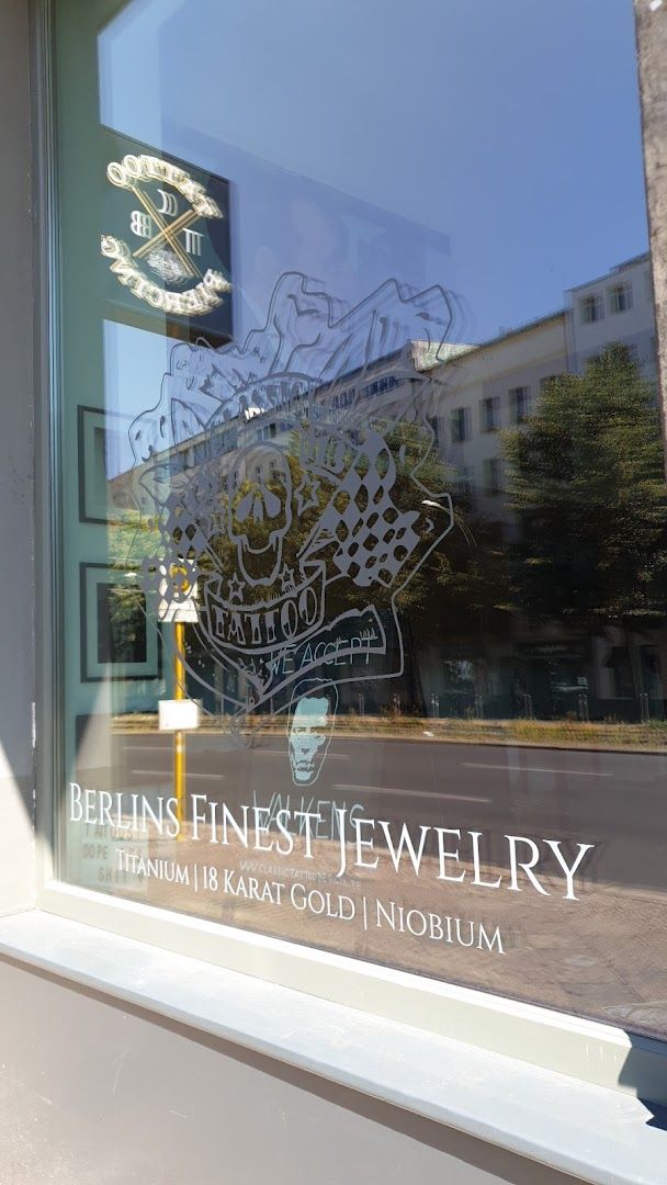 a window with a sign that says ben's jewelry