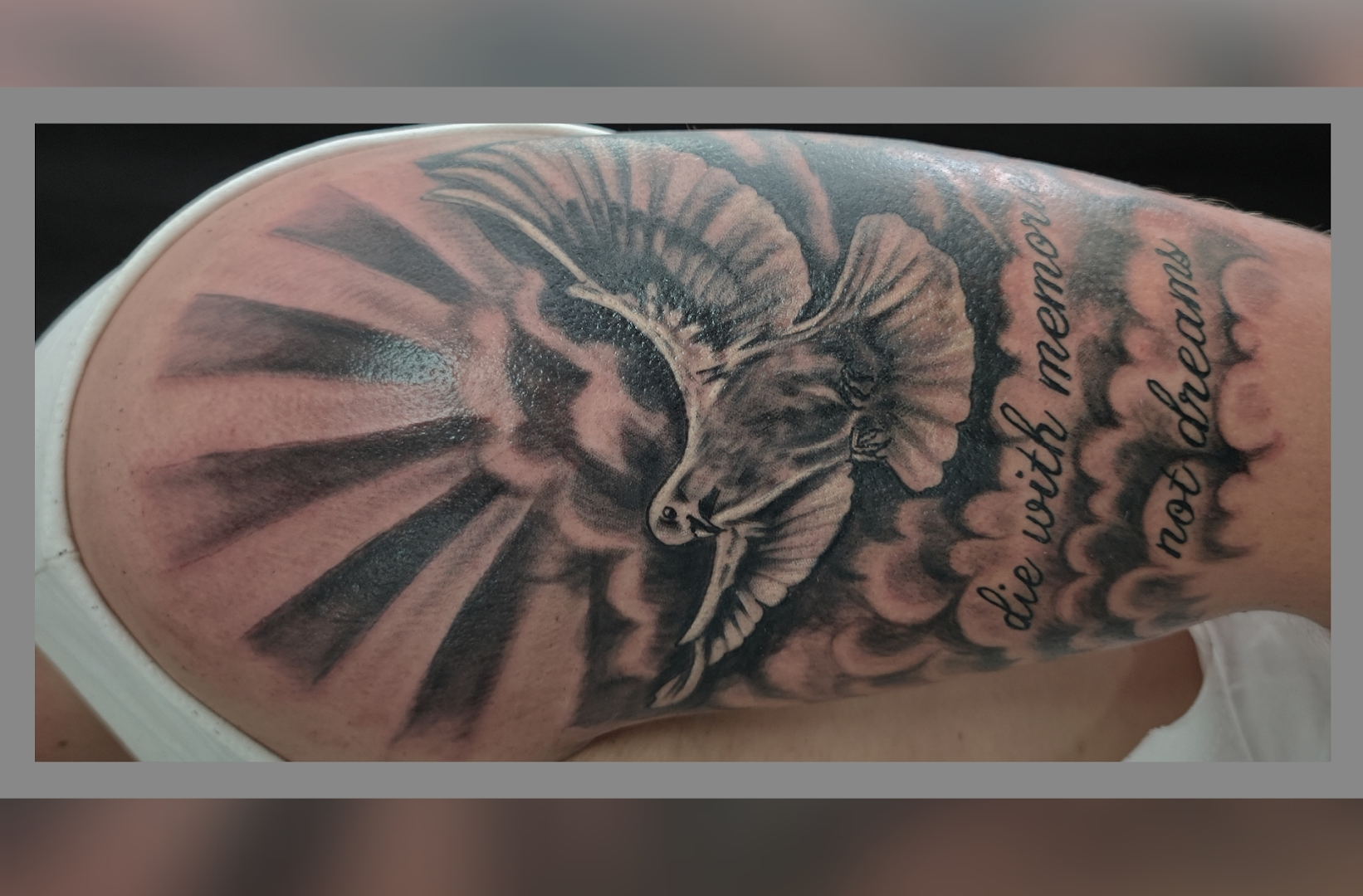 a cover-up tattoo of a goat with a quote on it, main-kinzig-kreis, germany