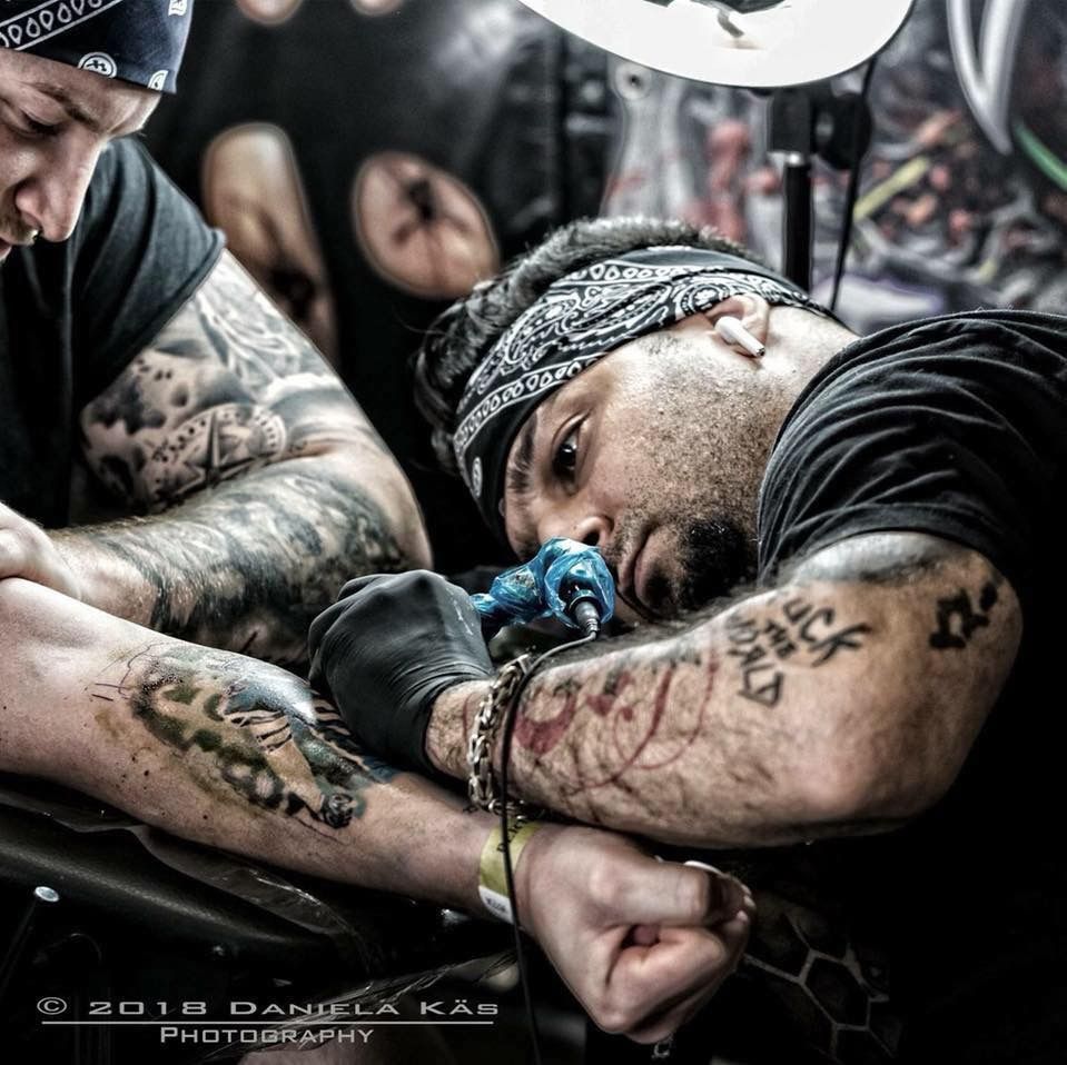 a man with japanische tattoos in leipzigs on his arm and arm, nürnberg, germany