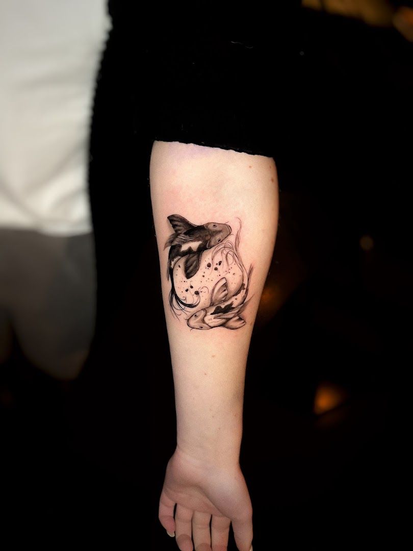 a japanische tattoos in leipzig of a cat on the arm, kassel, germany