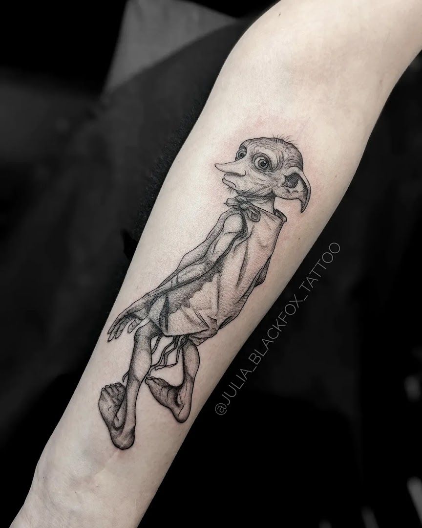 a narben tattoo of a bird on the arm, frankfurt, germany