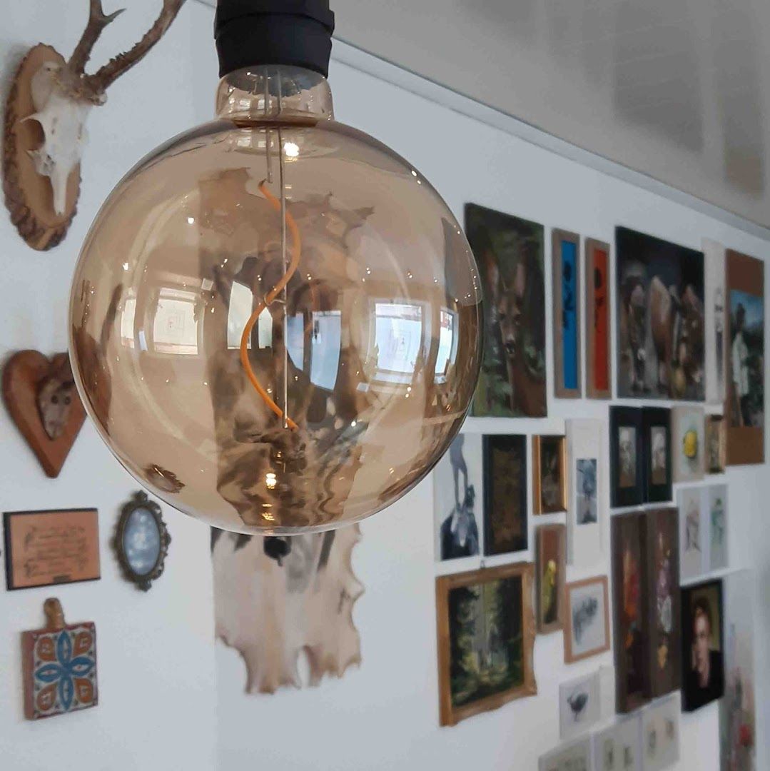 a light fixture hangs on the wall in a home