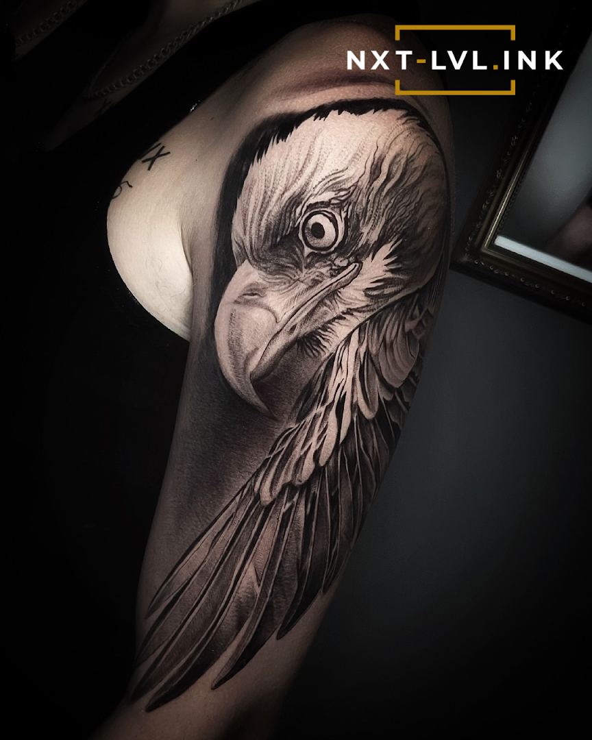 a black and white cover-up tattoo of an eagle, frankfurt, germany