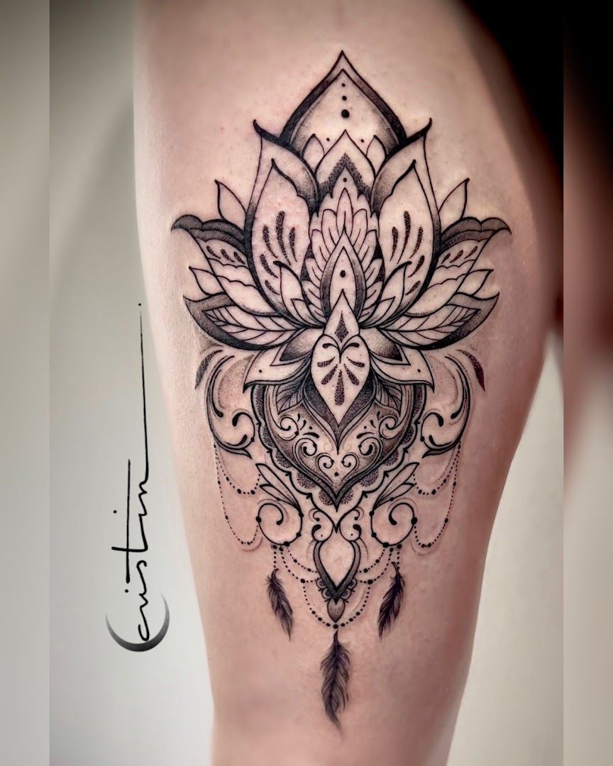 a black and white cover-up tattoo design on the thigh, bodenseekreis, germany