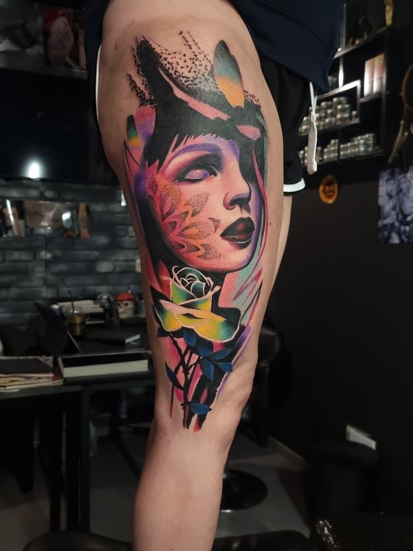 a narben tattoo of a woman with a colorful face, weißenburg-gunzenhausen, germany