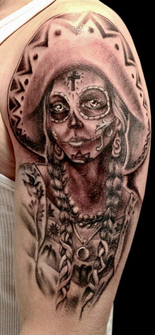 a cover-up tattoo of a woman with a skull on her shoulder, göppingen, germany