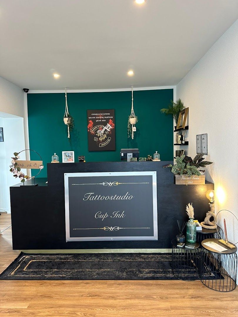 the front desk of the hotel with a sign that says,'hotel cafe '