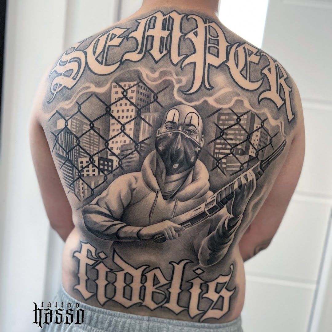 a man with a cover-up tattoo on his back, berlin, germany