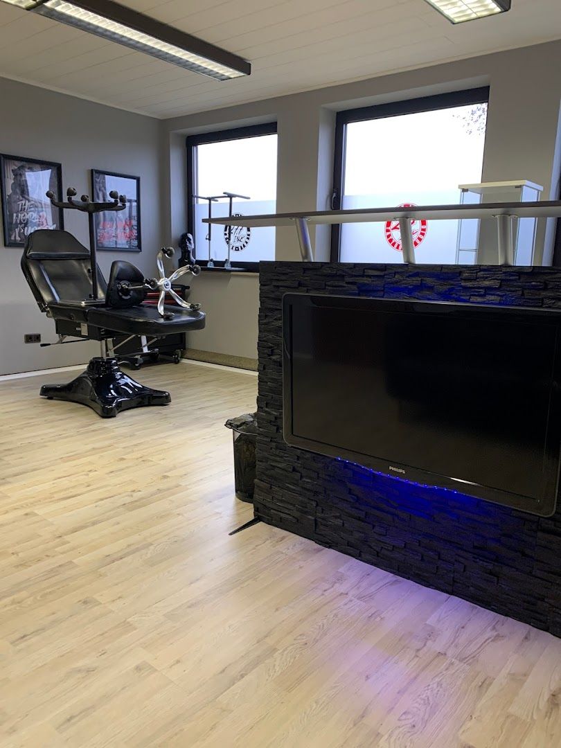 a gym room with a television and a tread tread tread tread tread tread tread tread tread tread tread