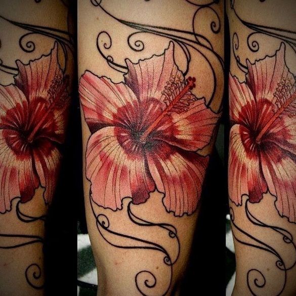 a narben tattoo with red flowers on the legs, bodenseekreis, germany
