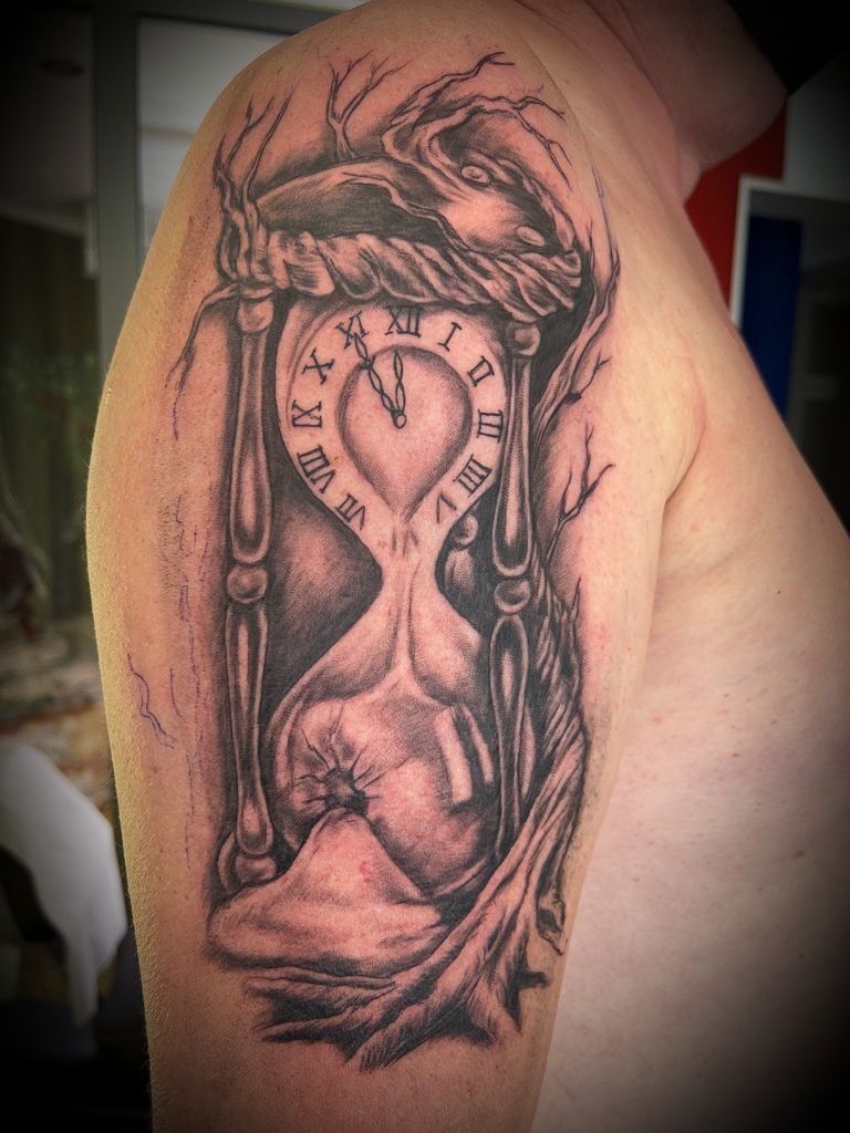 a cover-up tattoo of a woman holding a clock, rastatt, germany