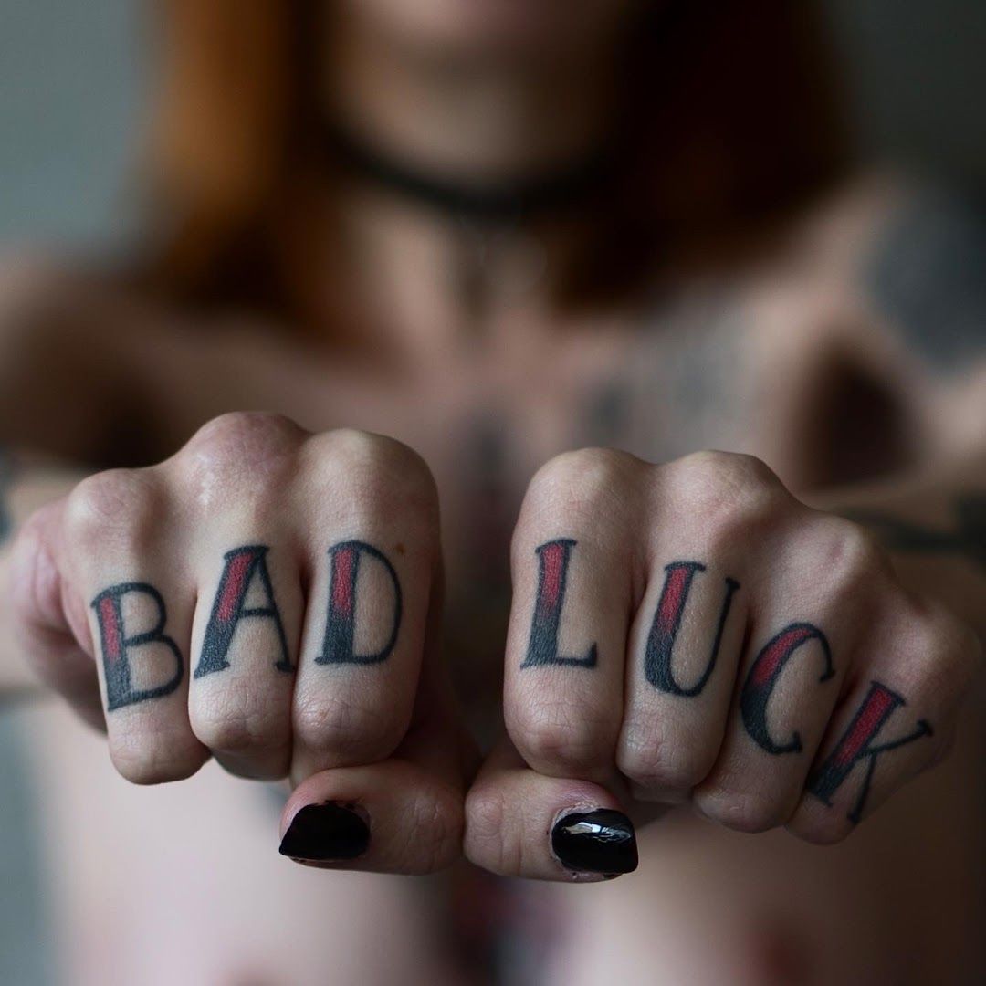 a woman with japanische tattoos in leipzigs on her hands and a tattoo on her finger, tuttlingen, germany