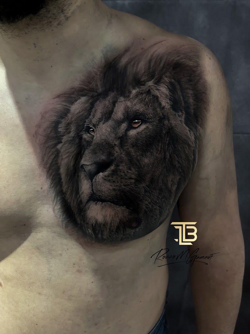 a man with a lion narben tattoo on his chest, minden-lübbecke, germany