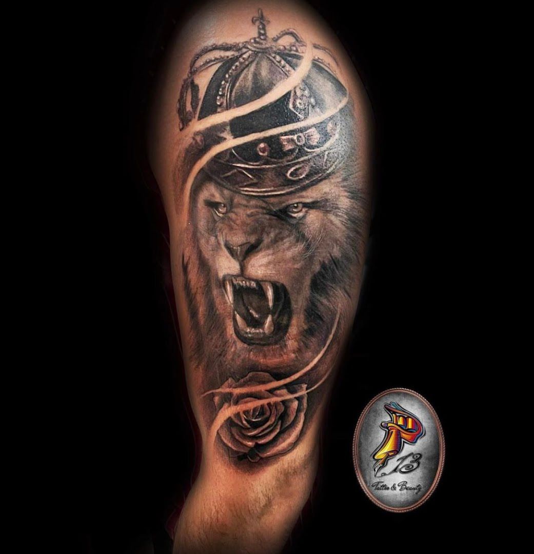 a cover-up tattoo of a lion with a hat on his head, sonneberg, germany
