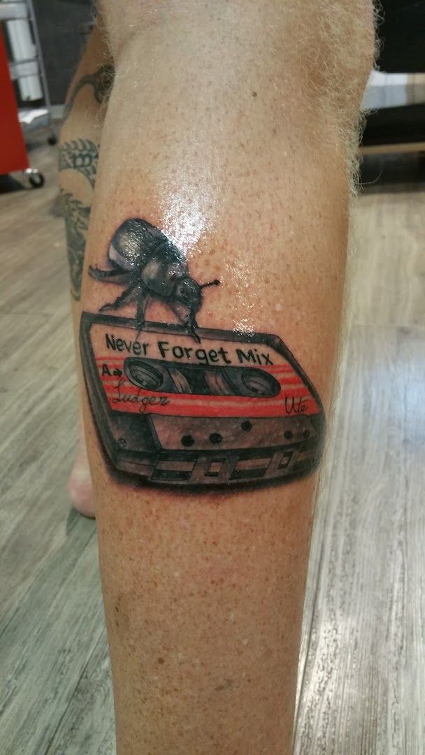 a cover-up tattoo of a car with the words'no to the car ', borken, germany