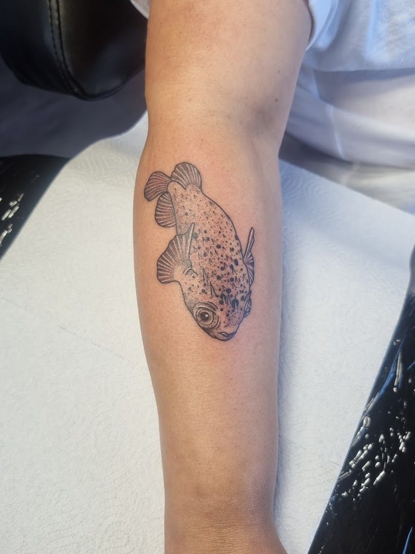 a narben tattoo of a fish on the arm, weißenburg-gunzenhausen, germany