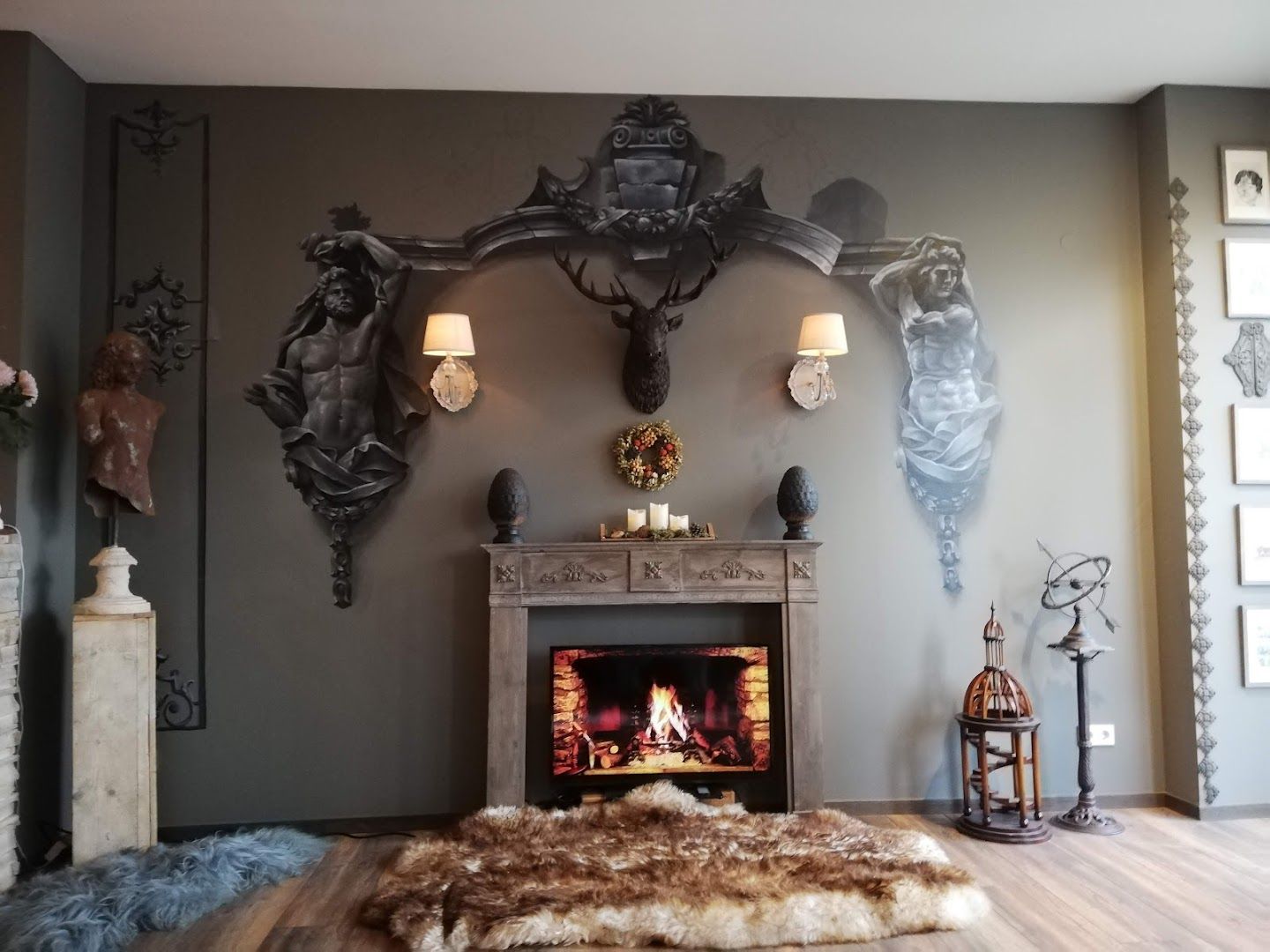 a fireplace with a large animal head on the wall