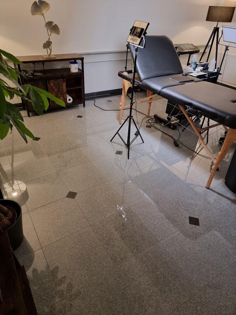 a room with a desk and chair in it