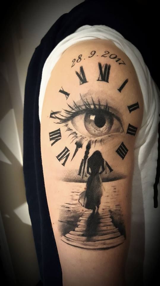 a man with a clock cover-up tattoo on his arm, mönchengladbach, germany