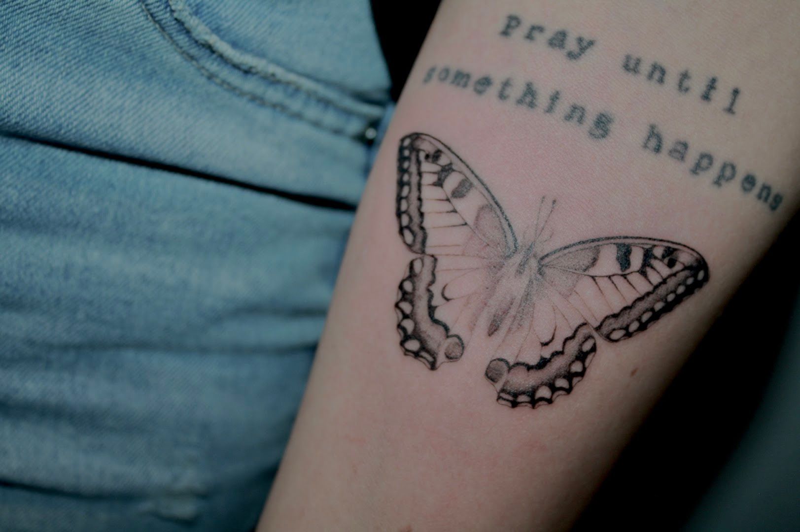 a butterfly narben tattoo on the arm, rhein-sieg-kreis, germany