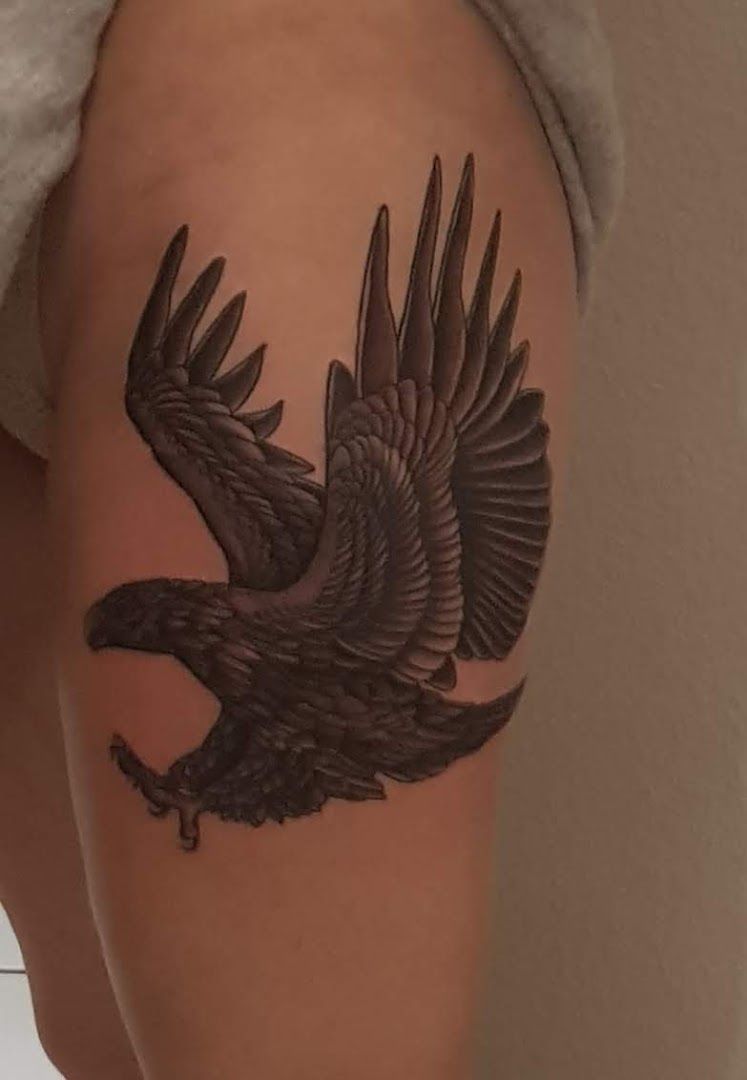 a black bird narben tattoo on the arm, giessen, germany