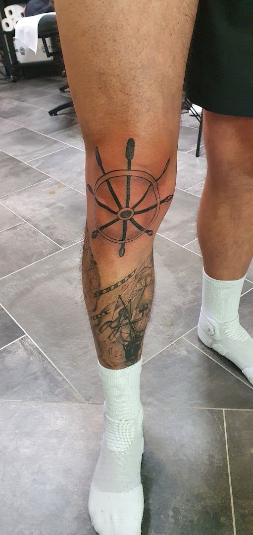 a man with a cover-up tattoo on his leg, bad kreuznach, germany