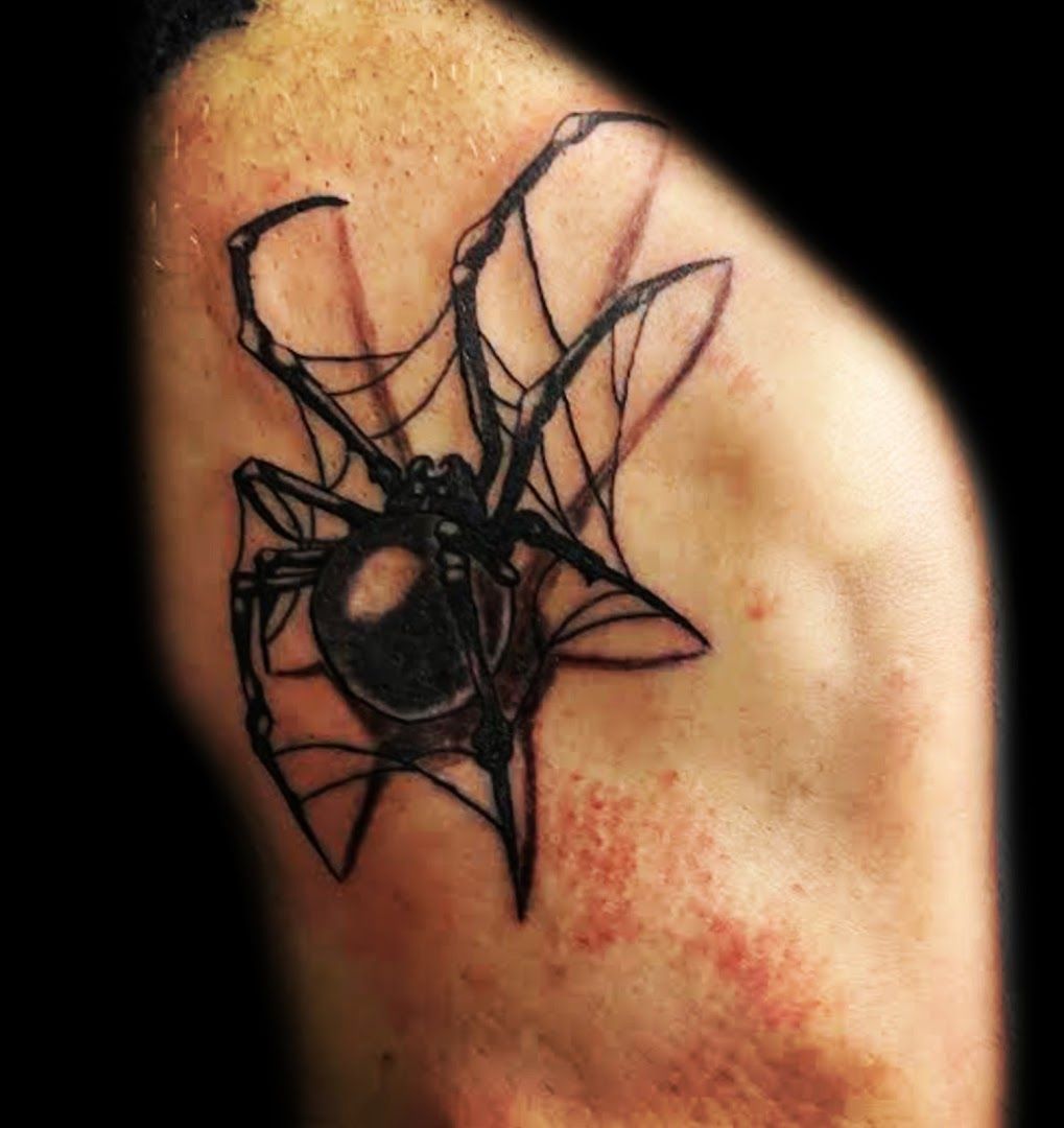 a japanische tattoos in leipzig of a spider on the arm, biberach, germany