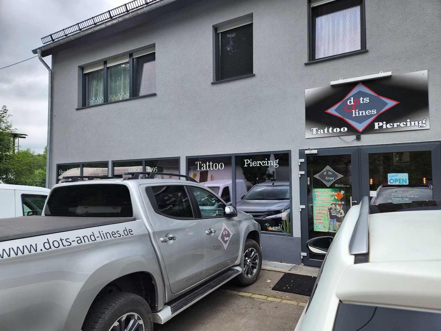 a truck parked in front of a building