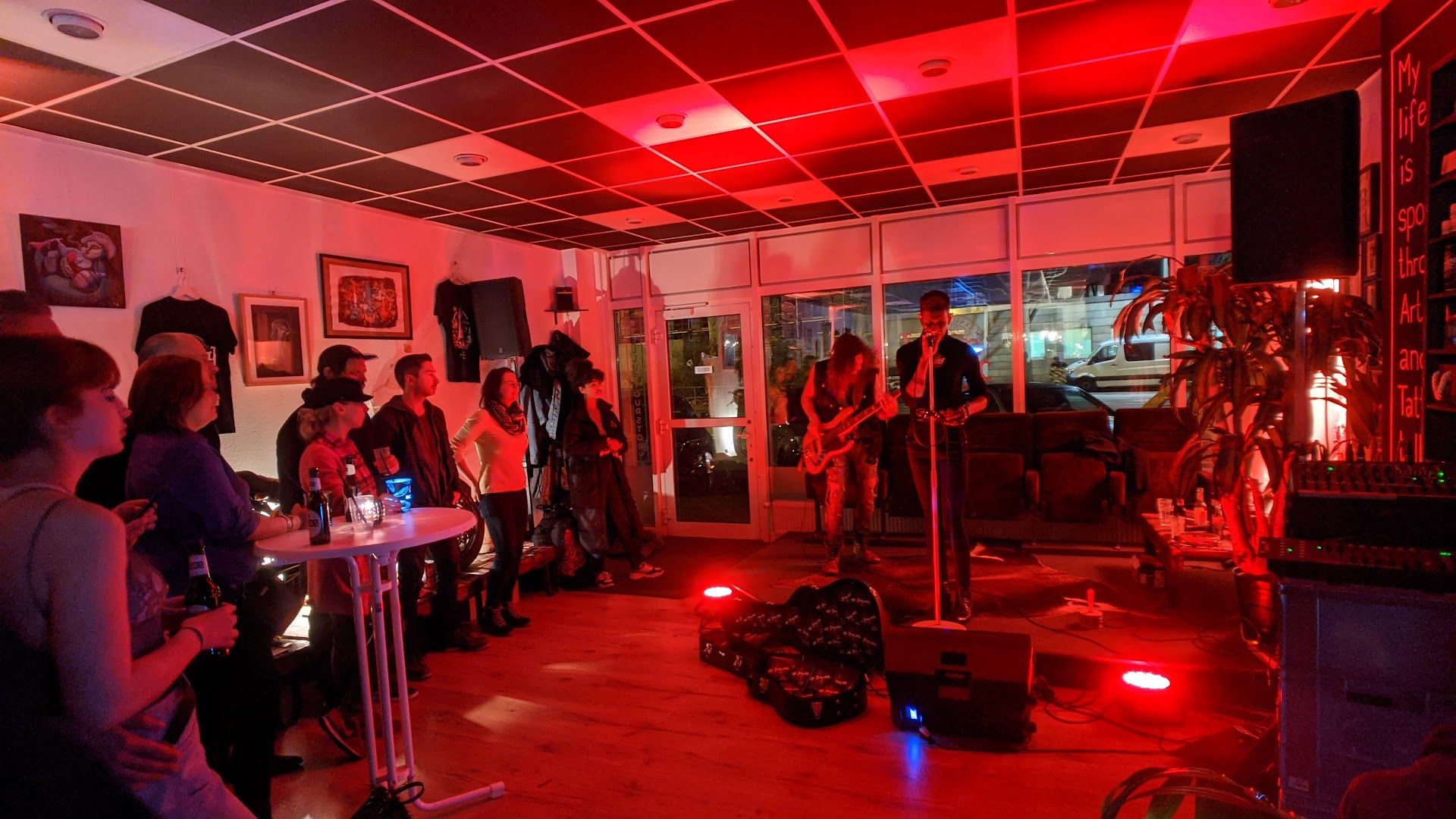 a group of people playing music in a room