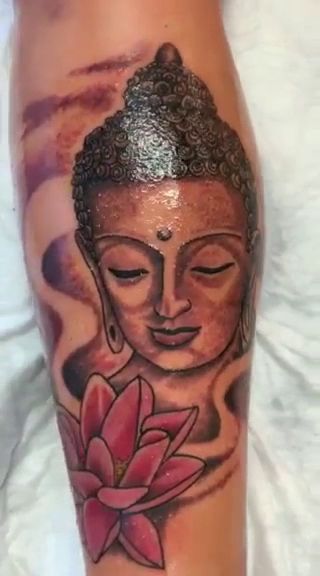 a narben tattoo of a buddha with a lotus flower, düsseldorf, germany