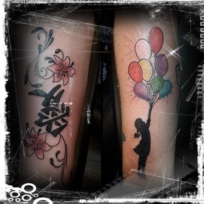 a couple of narben tattoos with balloons and a cat, märkischer kreis, germany