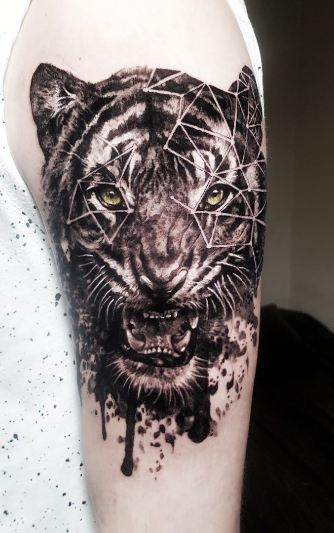 a black and white cover-up tattoo of a tiger, bielefeld, germany