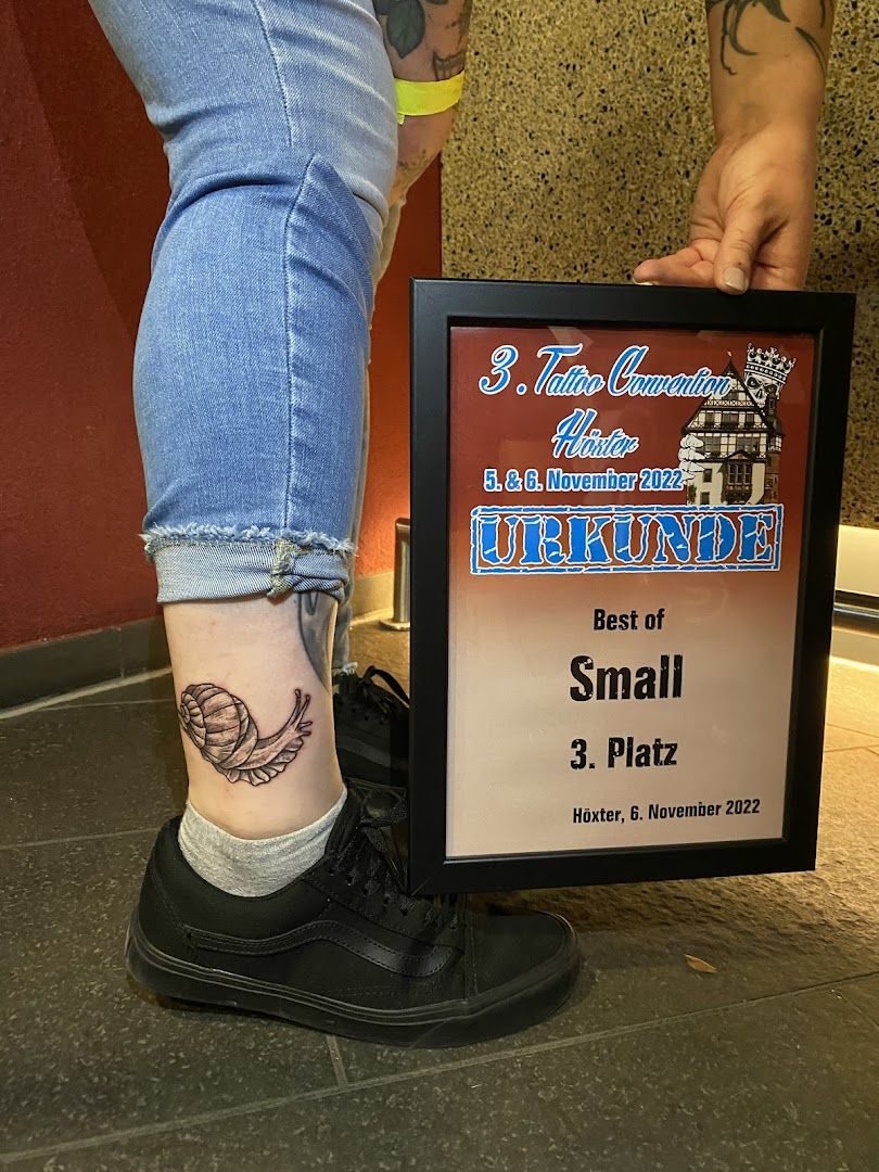 a person with a narben tattoo on their foot, northeim, germany