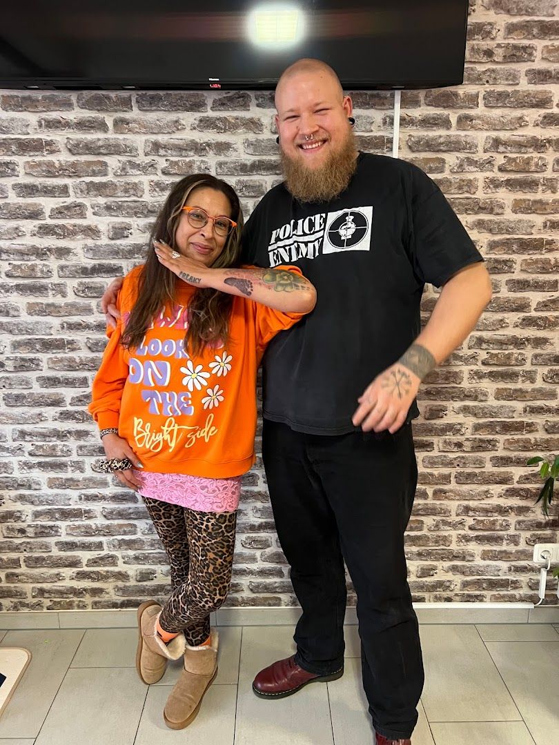 a man and a girl posing for a photo