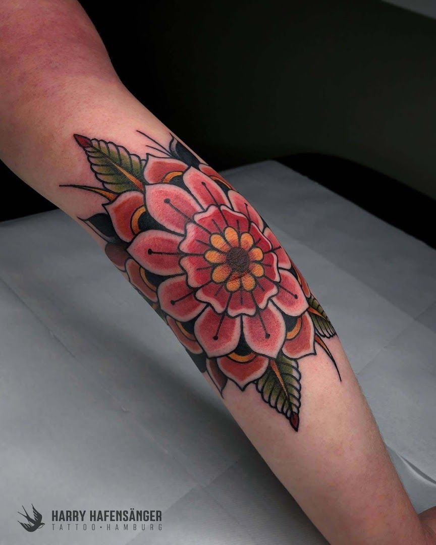 a narben tattoo of a flower on the forearm, hamburg, germany