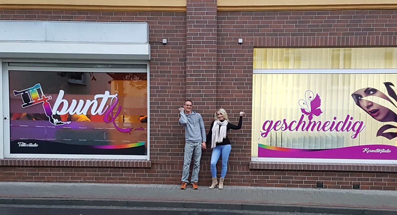 a man standing in front of a store