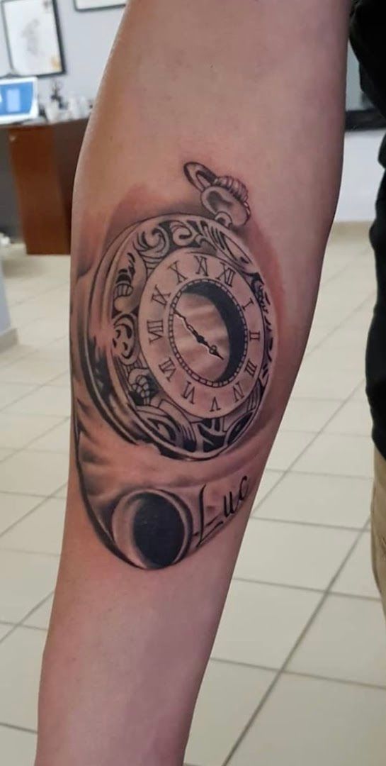 a cover-up tattoo with a clock on it, sächsische schweiz-osterzgebirge, germany