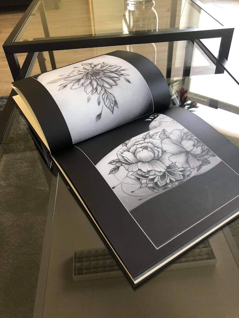 a book with a drawing of flowers on it