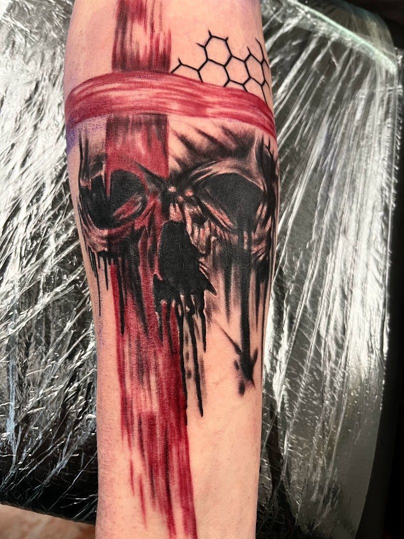 a cover-up tattoo with a skull and blood dripping down the side, bernkastel-wittlich, germany