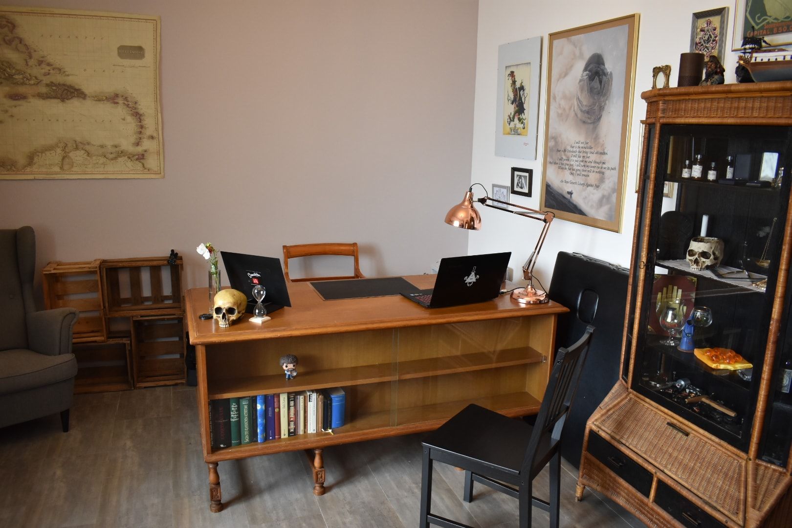 a wooden desk with a laptop on it