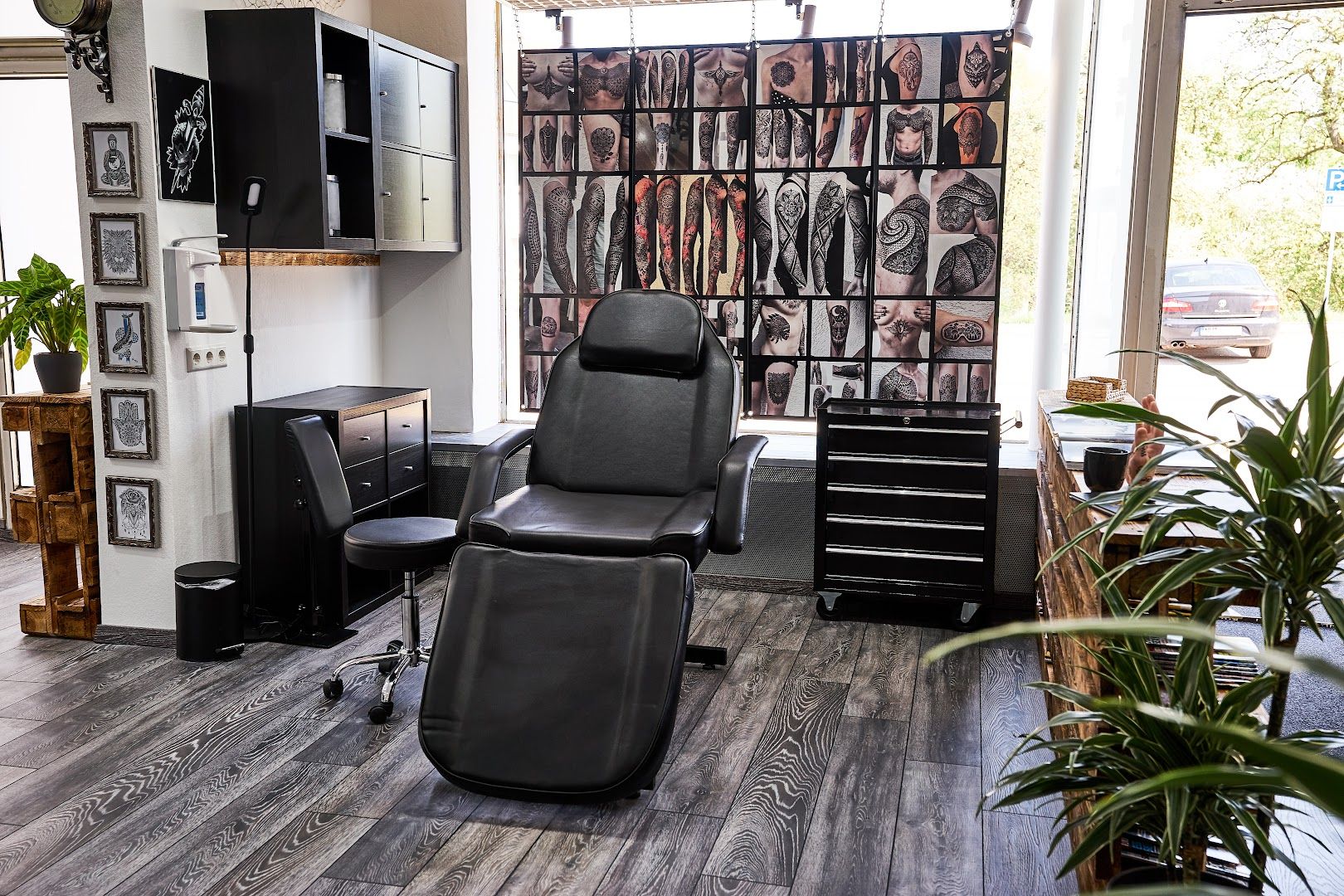 a salon room with a chair and a tv