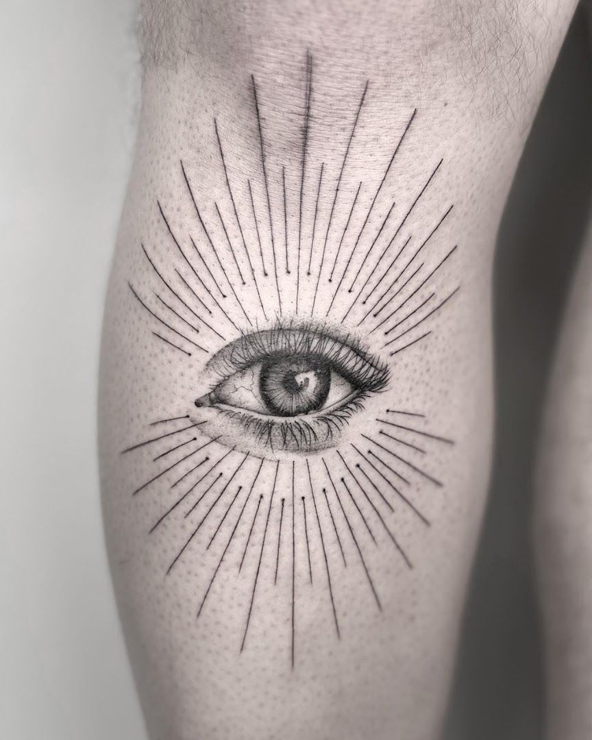 a man's leg with a narben tattoo of an eye, kreisfreie stadt karlsruhe, germany